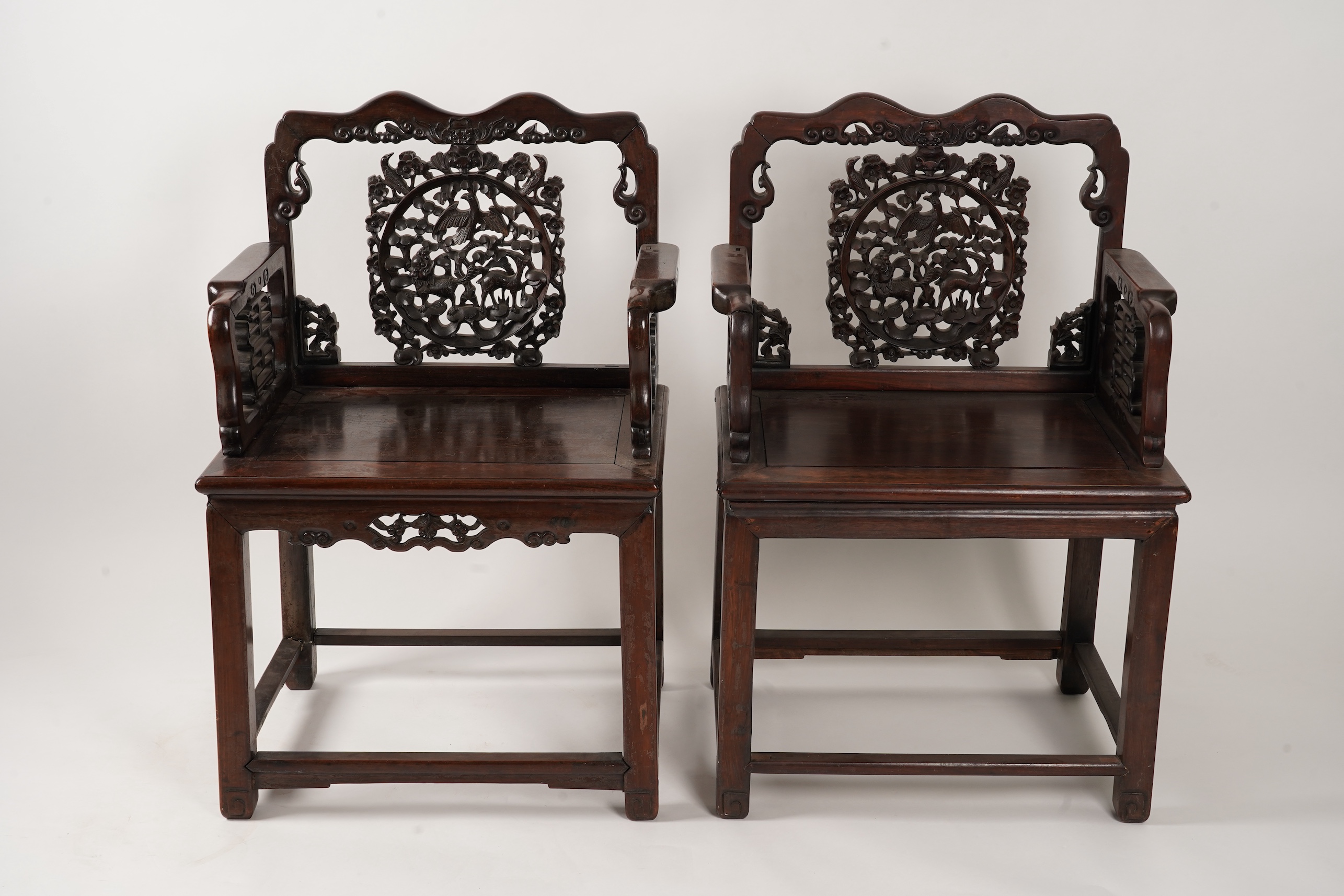 A pair of Chinese hongmu armchairs, late 19th century